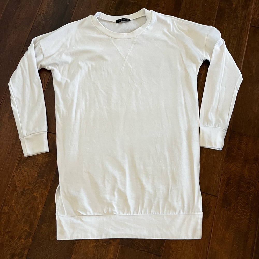 White, covers rear, sweatshirt